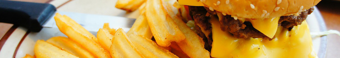 Eating American (Traditional) Burger at Left Bank Burger Bar restaurant in Jersey City, NJ.